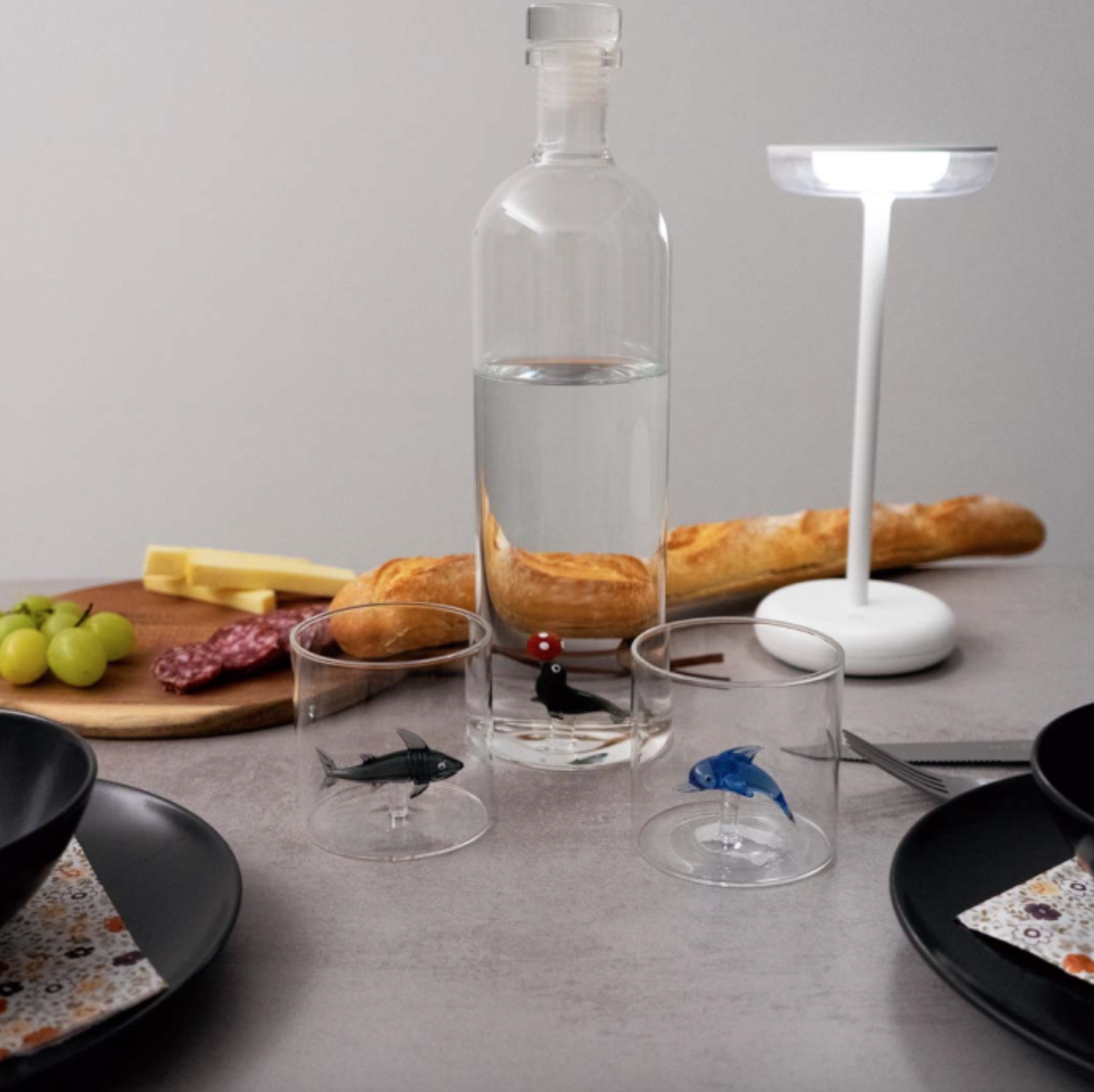 Bouteille en verre avec figurine Otarie