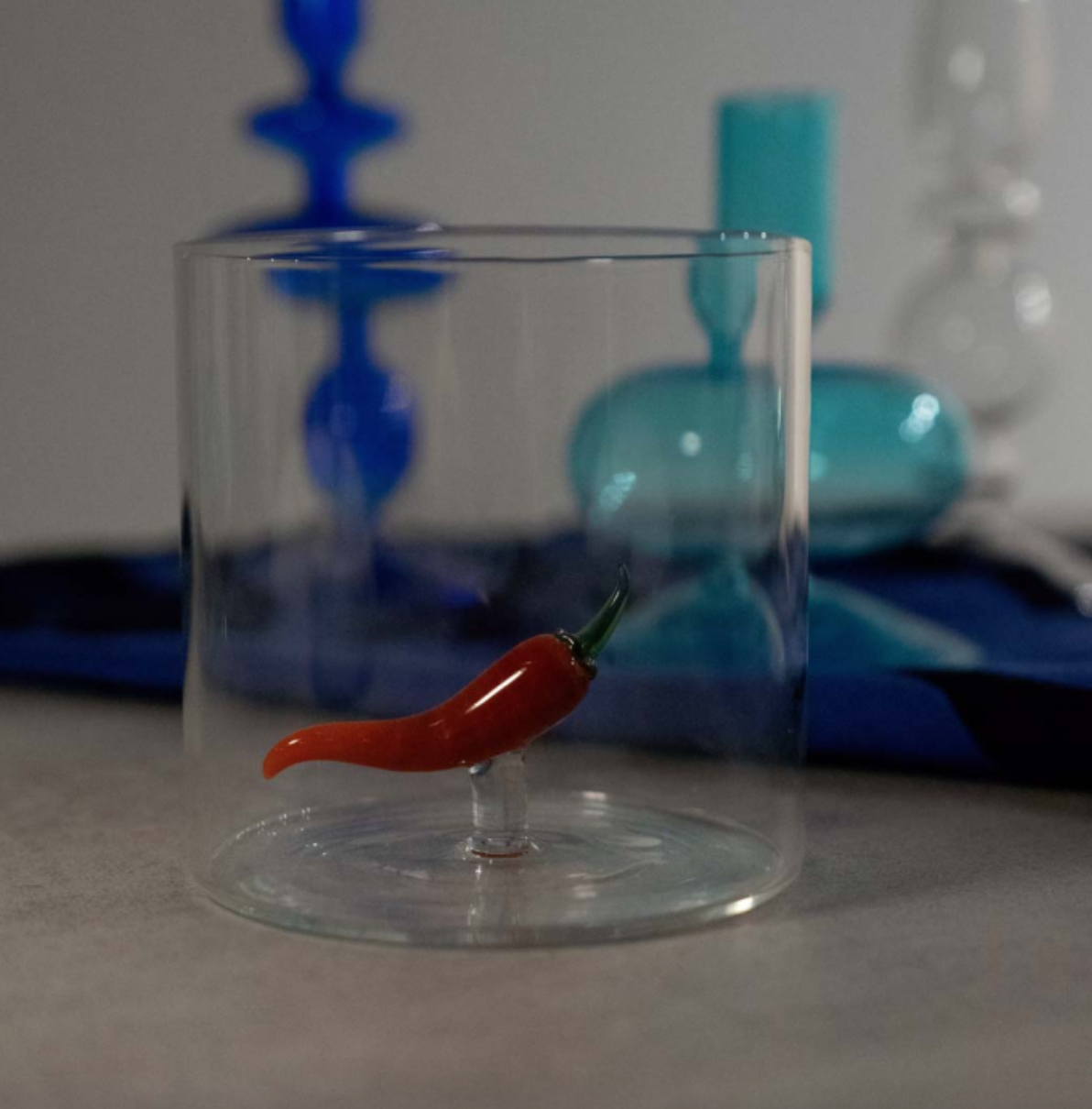 Verre avec figurine Piment