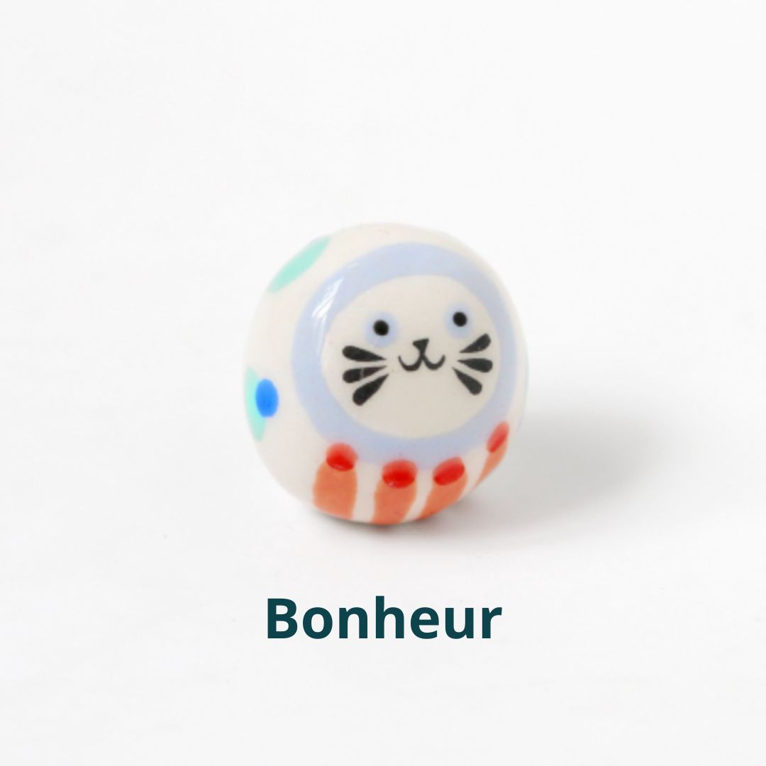 Grigri en faience - Bonheur